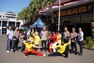 Polresta Malang Kota Bagikan 600 Porsi Makan Gratis, Warga Antusias dan Manfaatkan Layanan Cek Kesehatan Gratis