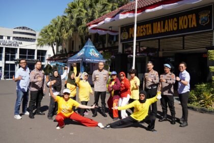 Polresta Malang Kota Bagikan 600 Porsi Makan Gratis, Warga Antusias dan Manfaatkan Layanan Cek Kesehatan Gratis