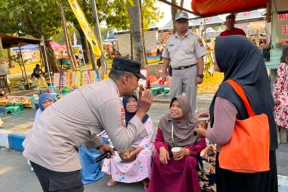 Pojok Kamtibmas Polres Ngawi Hadir di Pasar Krompol Ajak Warga Jaga Kamtibmas